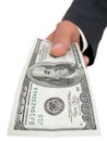 BusinessmanÃ¢â¬â¢s Hand Offering One Hundred Dollar Bill Royalty Free Stock Photo